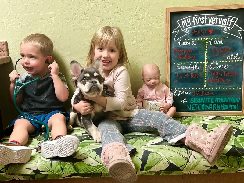 The team gathered for puppy photos.