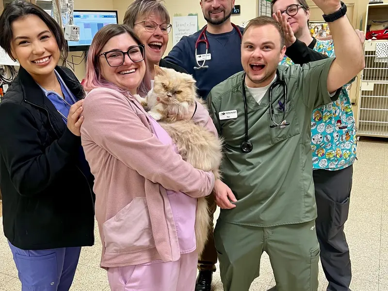 The team with a patient and plenty of smiles.