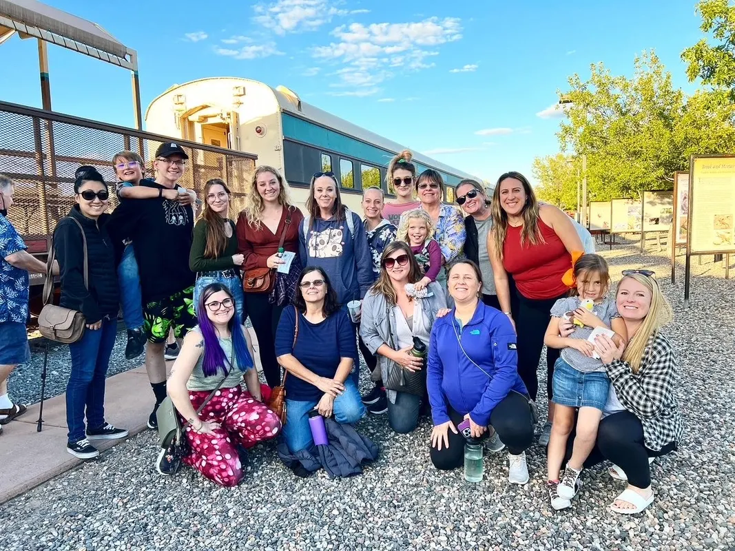 The team gathered outside together on a sunny Prescott day.